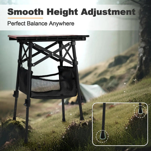 Portable Camping Table With Adjustable Height From 15.8 To 22 Inches Folding Outdoor Table With Storage Bag on grassy terrain