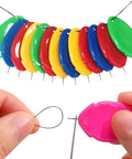 Easy Needle Threader Kit For Sewing Machines And Hand Embroidery, 5 Random Colors In Clear Box, close-up of threading process.