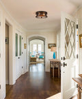 Industrial Farmhouse Two Light Drum Ceiling Fixture With Seeded Glass Shades In Black And Rustic Wood Grain Finish Installed