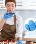 Person wearing Blue Nitrile Exam Gloves Disposable Latex Free Non Sterile Medical And Food Safe Powder Free 100 Count Box Medium Size