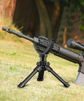 Shaped Rifle Rest With Portable Tripod Mount for Outdoor Shooting And Target Practice, Black Yoke Head in field setting