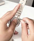 Person using Grab And Go All In One Eyeglass Repair Kit With 1000 Small Screws Nuts Washers Nose Pads And Curved Tweezers Micro Screwdriver
