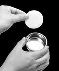 Inserting 58mm paper filter into portafilter, from Espresso 58Mm Paper Filters Replacement Pack With Storage Box 200 Sheets.