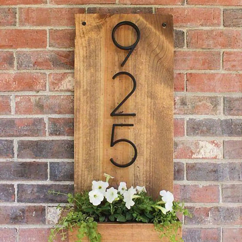 5 Inch Floating Stainless Steel Address Sign With Nail Kit For Outdoors Black Sign mounted on wooden board with flowers