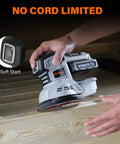 Person using Cordless 20V Max Random Orbital And Detail Sander With 2.0A Battery And Charger on wooden surface