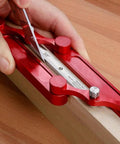 Hands using Top Tier Stainless Steel Center Gauge For Woodworking with 3/8 inch marking on wood for precise layout.