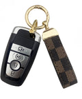 Top Shelf Leather Keychain With Secure Anti Lost D Ring And Heavy Duty Zinc Alloy Clip For Car And Home Keys, smooth checkered design.