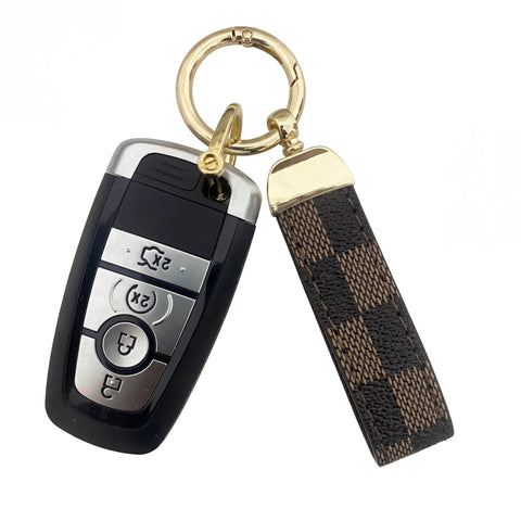 Top Shelf Leather Keychain With Secure Anti Lost D Ring And Heavy Duty Zinc Alloy Clip For Car And Home Keys, smooth checkered design.