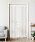 Pair Of Adjustable White Spring Tension Curtain Rods 28 To 48 Inches No Drill No Tools Easy Install Non Slip For Windows Doors Bathrooms And Doorways Anywhere holding sheer curtains in a light-filled room doorway.