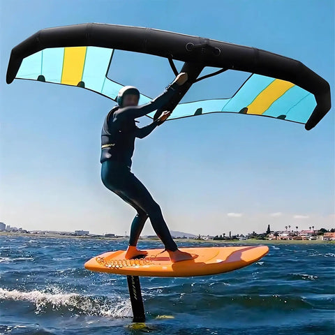 Inflatable Wing Foil For Water And Snow Sports With Pump And Backpack, Wingsurfer Kite For Hydrofoil Boards in use on water.