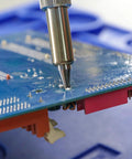 Efficient Desoldering Station With 80W Power, Auto Shutoff, and Precise Temperature Control in use on a circuit board