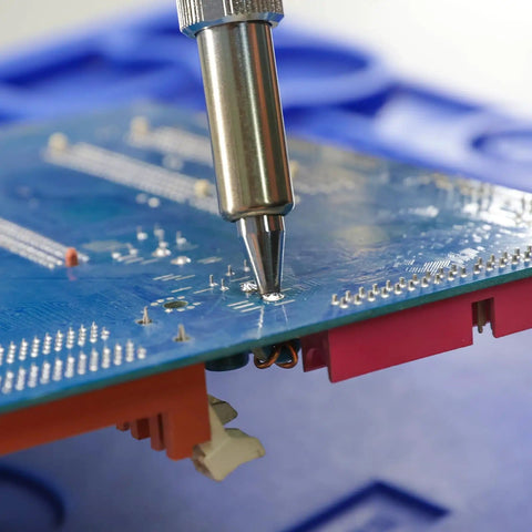 Efficient Desoldering Station With 80W Power, Auto Shutoff, and Precise Temperature Control in use on a circuit board