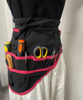 Heavy Duty Workhorse Sewing Organizer Belt With Industrial Stitching And Multipocket Tailoring Girdle holding tools in multiple pockets.