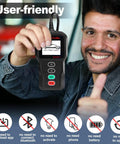 Smiling man holding user-friendly car diagnostic tool with icons depicting no app or Bluetooth needed, no need for battery or phone.