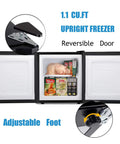Straight Up Chilling 1.1 Cubic Foot Upright Mini Freezer With Reversible Single Door And Dial In Temp Settings Featuring Sturdy Removable Rack In Sleek Stainless Look, showcasing adjustable foot and interior storage.