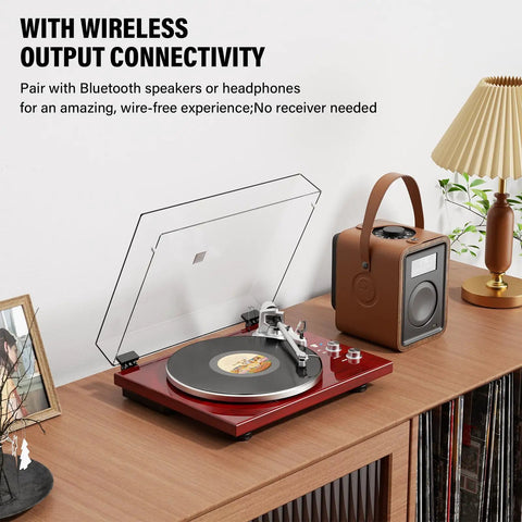 Cool Red Belt Drive Turntable For Vinyl Records With Bluetooth Output Connection Compatible With Active Speakers and Wireless Headphones on a wooden desk.