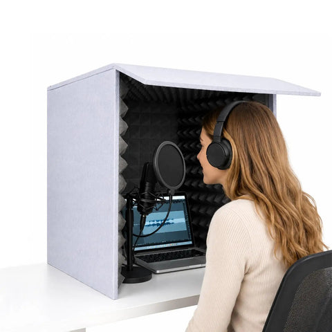 28 Inch Foldable Portable Vocal Recording Booth Featuring High Density Acoustic Foam Panels for sound isolation with woman using a microphone.