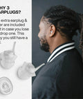 Person wearing Music Pro Concert Ear Plugs That Keep Your Ears Safe And Your Sound Clean For Gigs And Live Events Up To 20dB Noise Reduction, Reusable Ear Plugs With Filter Set And Case, with close-up of ear plugs and extra filter.