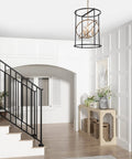 Dope Black And Gold Three Light Drum Pendant Chandelier With Height Adjustable Rods For Dining Room Kitchen Island Foyer And Bedroom 14 Inch Diameter By 18 Inch Height Yet Fresh Lighting Fixture hanging in a white entrance hallway.