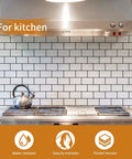 Thick 3.3mm Peel And Stick Subway Backsplash Tiles 12x12 White With Black Grout installed in a kitchen above a stove.