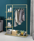 Top Shelf Golden Metal Garment Rack With Five Tier Storage Shelves Portable Clothes Hanging Organizer holding clothes in a chic living space.