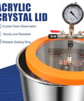 Acrylic crystal lid with gauge on top of a stainless steel vacuum chamber for epoxy resin degassing.