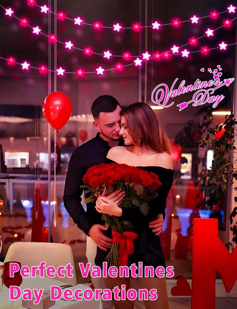 Couple embracing with Lit 32 8Ft RGB Fairy Lights With 66 Acrylic Star LEDs illuminating in background, Valentine decor.