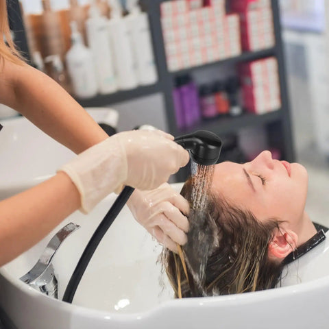 Pro Grade Brass Shampoo Bowl Faucet And Sprayer Kit For Salon Backwash Unit in use during hair washing at spa station