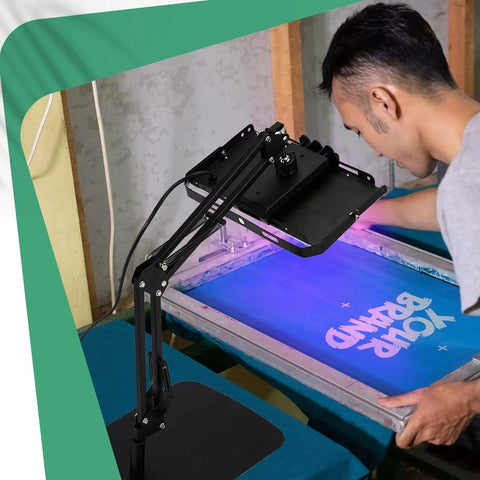 Man using 50W LED UV Screen Printing Exposure Unit With Retractable Adjustable Stand for emulsion curing on blue screen