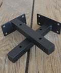 Hella Sturdy Black Industrial Floating Shelf Brackets Set Of Two Heavy Duty wall mount supports on wooden surface.