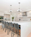 Bright kitchen with Ezra 14 Inch 3 Light Modern Pendant Light With White Metal Shade And Brushed Nickel Finish over island