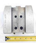 Top view of One Inch Slot Width Lathe Turret Tool Block With 40mm By 65mm Bolt Pattern H01B-1RL-N-W 1.0 with measuring tape