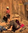 Two climbers on rocky terrain with gear, one sitting on Ultralight Camping Sit Pad For Backpacking And Hiking, Pink, by AceCamp