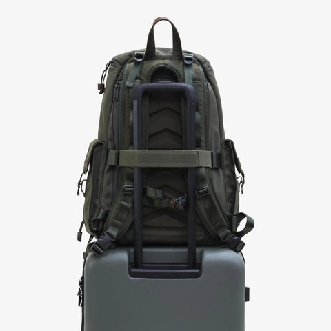 Back view of Large Customizable Camera Backpack For Pro Photographers With 16 Inch Laptop Pocket And Exterior Tripod Straps on luggage