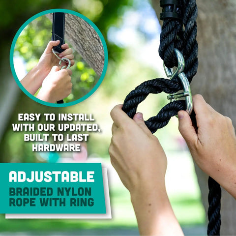 Close-up of hands attaching braided nylon rope with metal ring for heavy duty plastic disc swing with rope and leg protectors.