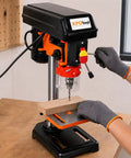 8 Inch Swing Benchtop Drill Press With Safe Laser Positioning And Digital Meter For Precise Drilling, user adjusting drill on wood.