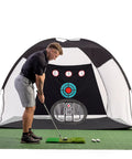 Man practicing with Massive 10x7ft Golf Practice Net Kit With Hitting Net Chipping Net Tri Turf Mat And Target Mat For Backyard Driving Indoor Or Outdoor Training Perfect Gift For Golfers And Dads.