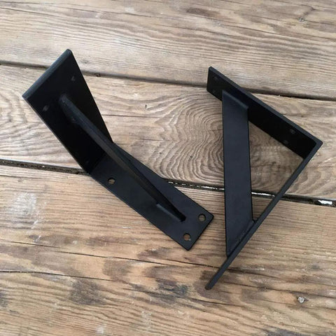 Rock Solid Floating Shelf Brackets Heavy Duty Tripod Wall Supports That Hold Up Like Champs Slick Black Iron Rack Mounts close-up view.