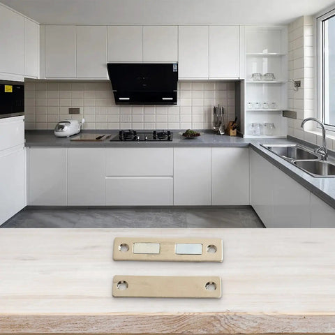 Magnetic Cabinet Door Catch With Screws For Cupboard Wardrobe Drawer Closure, shown on countertop with modern kitchen backdrop