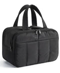 Lightweight Puffy Travel Toiletry Bag For Women With Handle Must Have Large Cosmetic Organizer in black with zippers and handle.