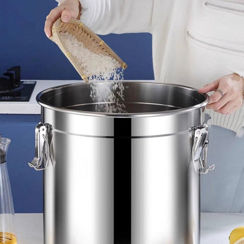 Heavy Duty 26 Gallon Airtight Food Dispenser Bucket For Bulk Flour Rice Coffee Beans Keep Pantry Staples Crisp With This Legit Canister that is being filled with rice.