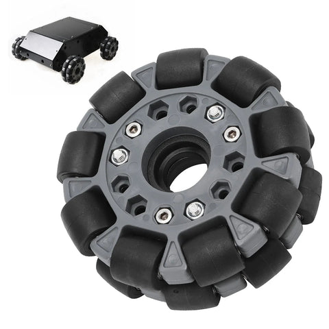 Close-up of 100mm nylon-rubber omnidirectional wheel with black rollers on gray hub; robot chassis inset
