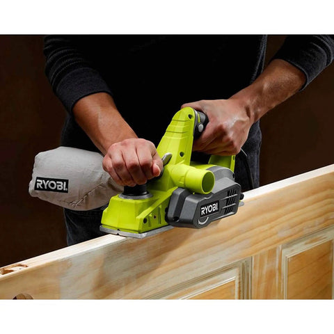 Person using Beast Corded Hand Planer With Kickstand And Dual Dust Ports, 6 Amp, 16,500 RPM, 3 1/4 Inch Cutting, on wood
