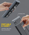 Hands holding Mini Electric Precision Screwdriver Kit With LED Light And 24 Magnetic Bits High Torque 3 Nm Storage set showing pop-up mechanism.