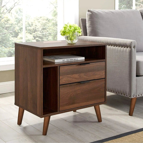 Walnut finish wood side table with angled legs next to a sofa