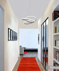 Modern LED Ring Pendant Light Fixture For Dining Rooms And Kitchen Islands, Ceiling mounted in a hallway, acrylic grey design.