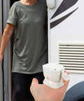 Heavy Duty Rv Door Catch Keeps Enclosed Trailer And Camper Entry Secure With Easy Install Sturdy Locking Mechanism Plastic Holder in hand.