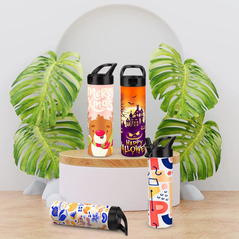 Four Eight Pack 20oz Dope Sublimation Tumbler Set with festive designs, standing on a table among green leaves.