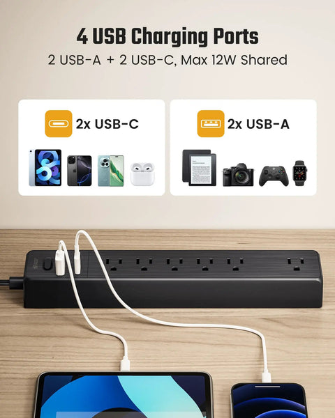 All In One Power Strip With 6 AC Outlets 2 USB C 2 USB A Four And A Half Foot Cord 900 Joules Surge Protection Black shown with devices