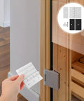 Shower Glass Door Hinge Replacement For Sauna And Steam Rooms With Black Gasket And Screws, showing installation on wood sauna door.